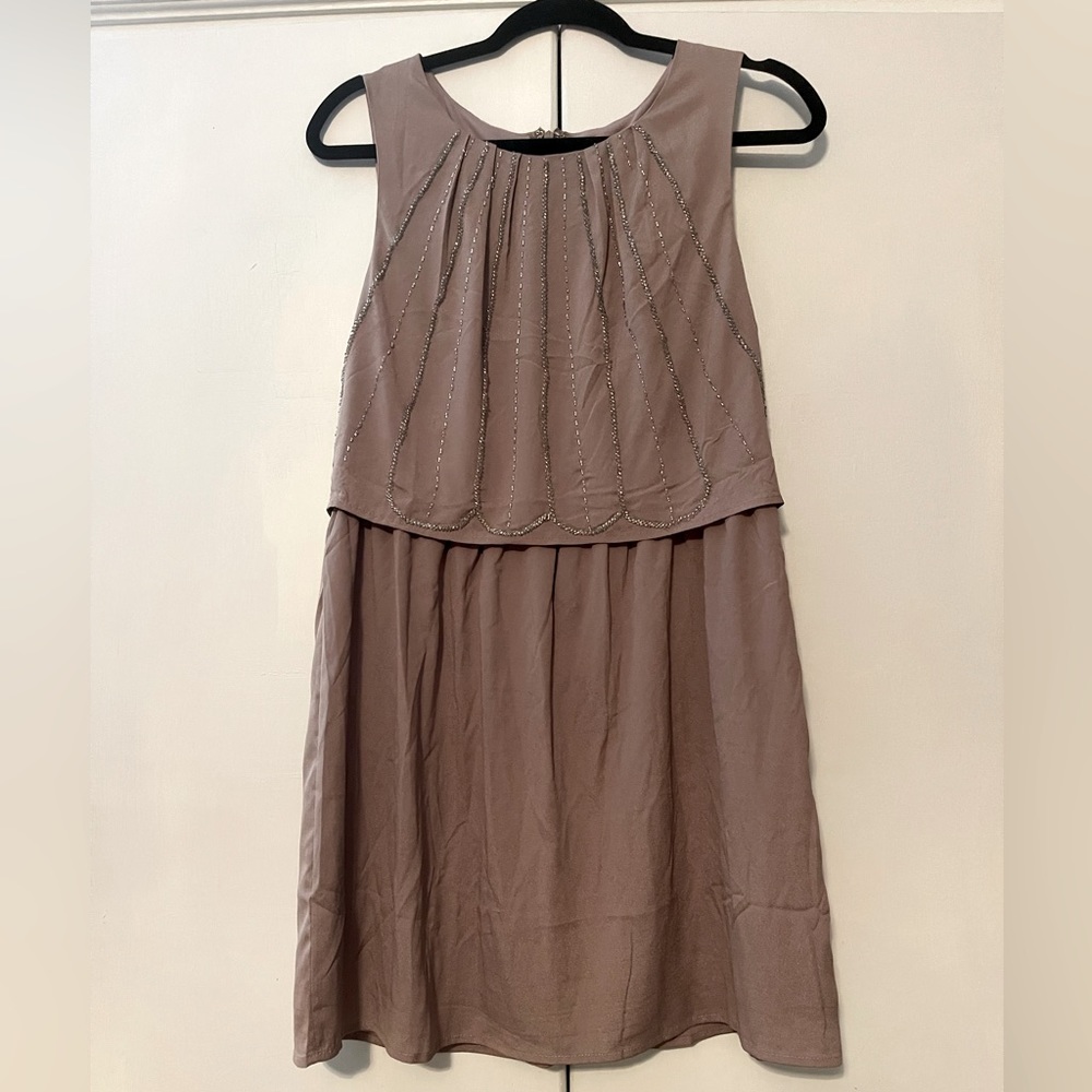 Material girls dress with beading